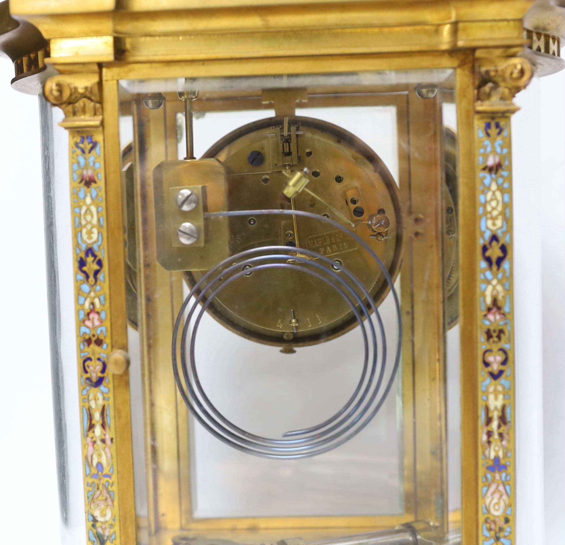 A late 19th century French gilt brass and champleve enamel cased eight day four glass mantel clock, 34cm high